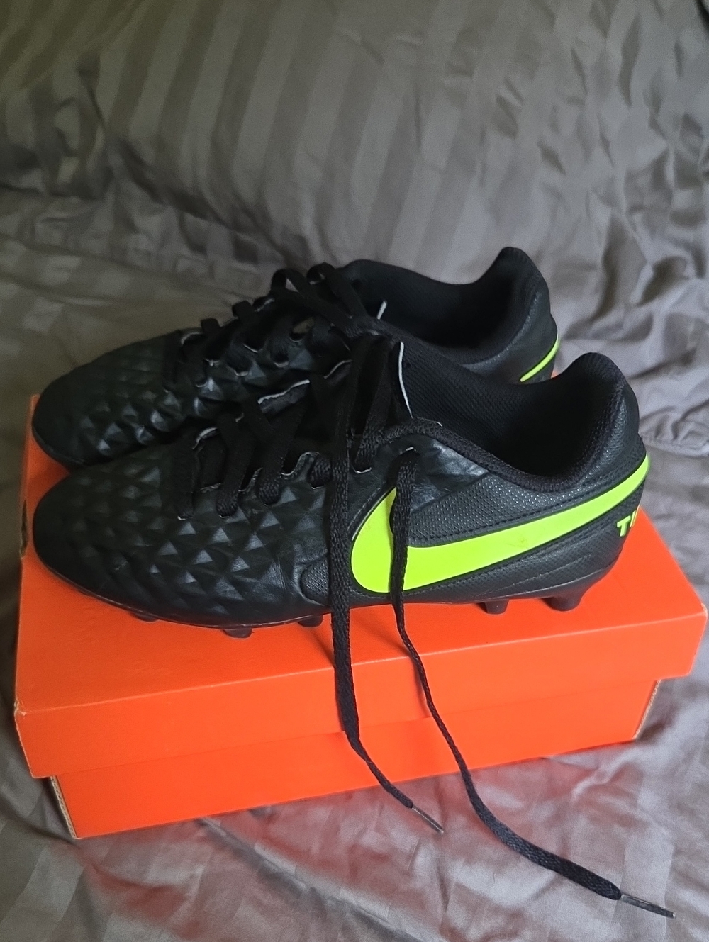Nike Black Soccer Cleats with Neon Yellow Swoosh